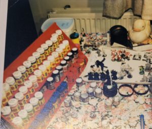 Home made paintstand with GW hex pots on a kitchen table. 1990's.