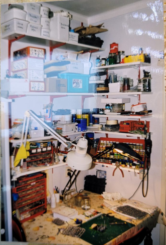 My first Workshop: shelves with stuff and a table. 1999