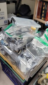 A big collection of bases for miniatures neatly ordered in ziplock bags